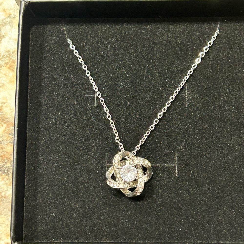Silver Love Knot Pendant with Cubic Zirconia Stone
